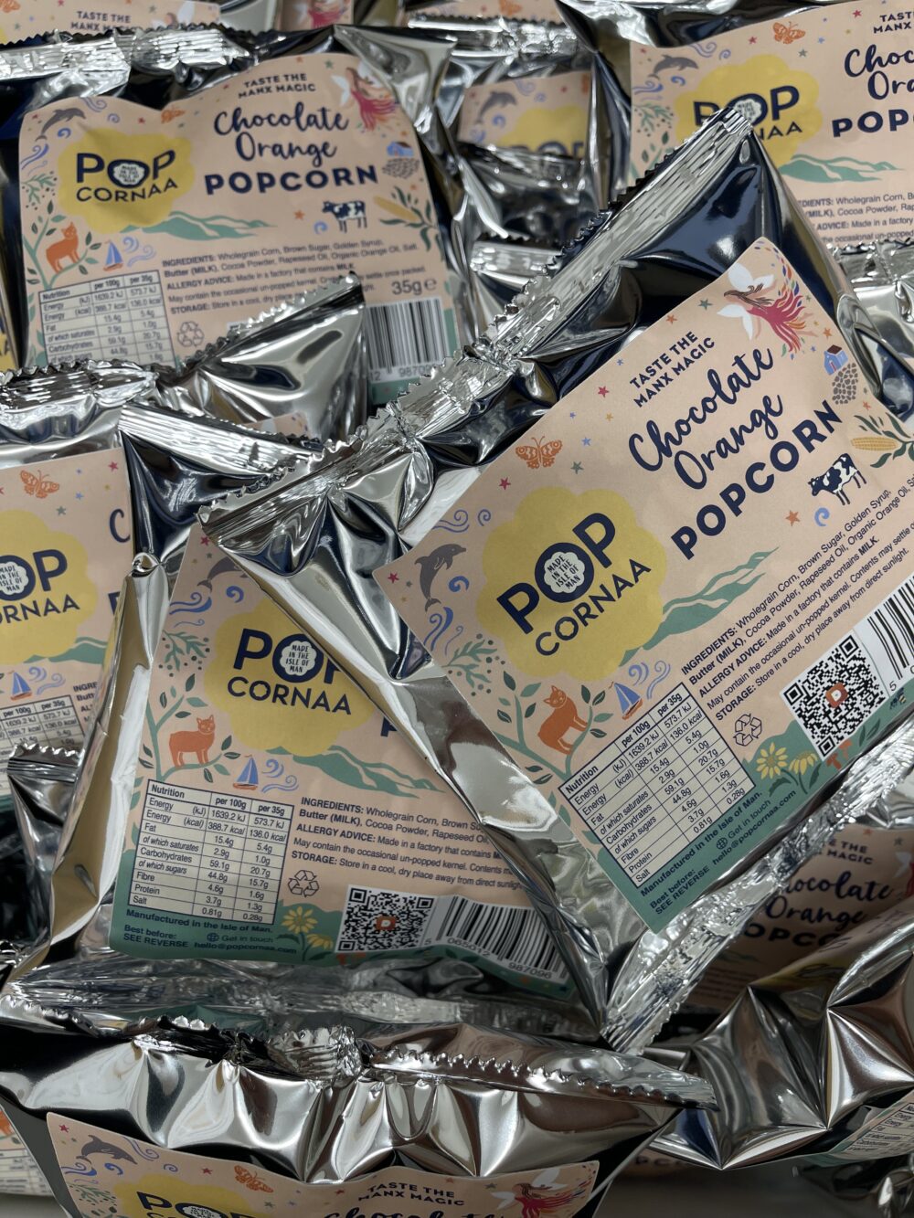 A 35g bag of Popcornaa Chocolate Orange Popcorn, featuring vibrant packaging with an image of the delicious popcorn. The bag highlights the perfect combination of rich chocolate and zesty orange flavor, making it an irresistible snack choice.