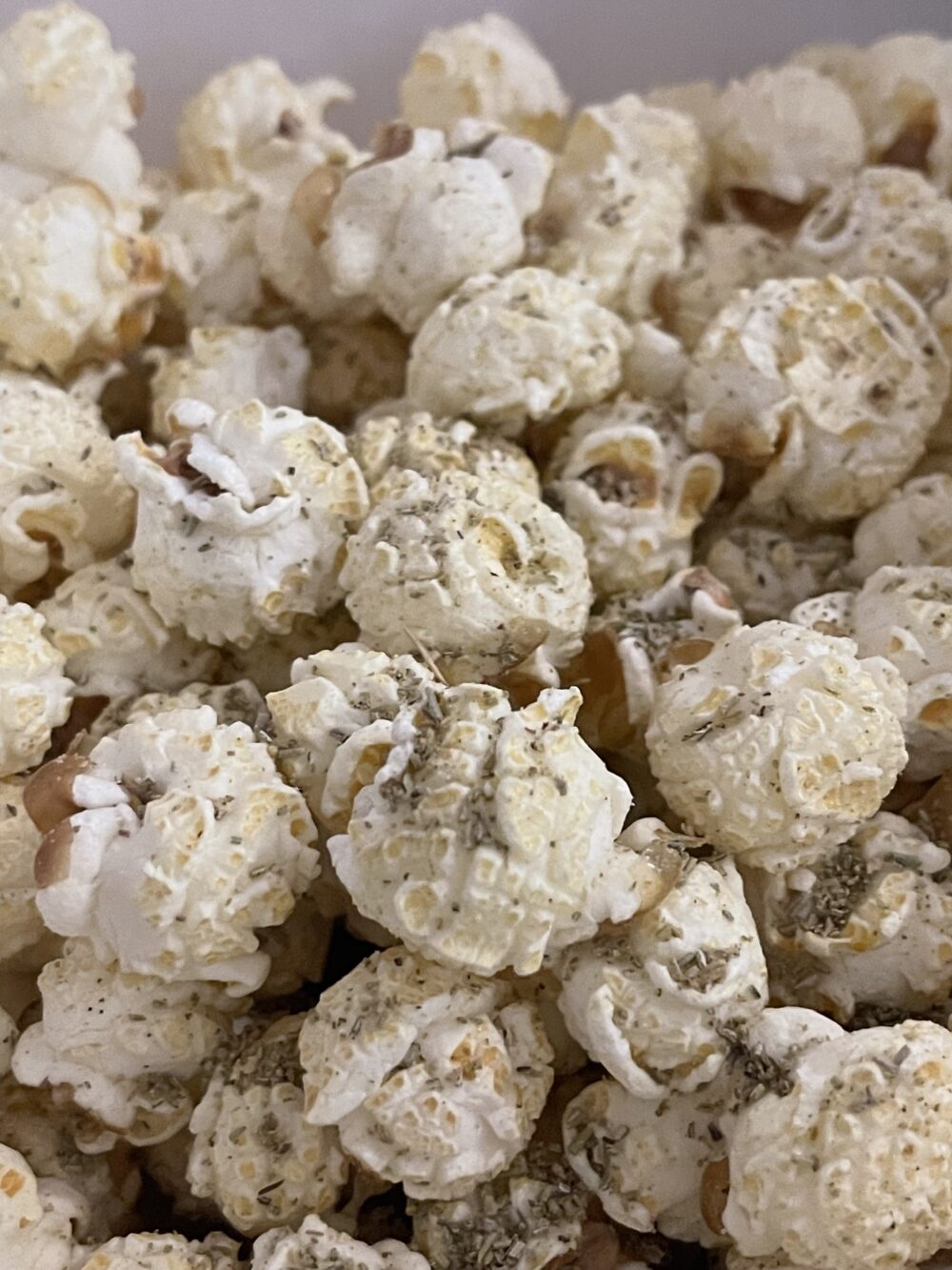 A close-up of PopCornaa's multi-award-winning Vegan Seaweed, Wasabi & Soy Popcorn.